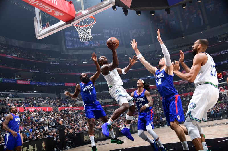 LOS ANGELES, CA - MARCH 12: Anthony Edwards #5 of the Minnesota Timberwolves drives to the basket during the game against the LA Clippers on March 12, 2024 at Crypto.Com Arena in Los Angeles, California. NOTE TO USER: User expressly acknowledges and agrees that, by downloading and/or using this Photograph, user is consenting to the terms and conditions of the Getty Images License Agreement. Mandatory Copyright Notice: Copyright 2024 NBAE (Photo by Adam Pantozzi/NBAE via Getty Images)