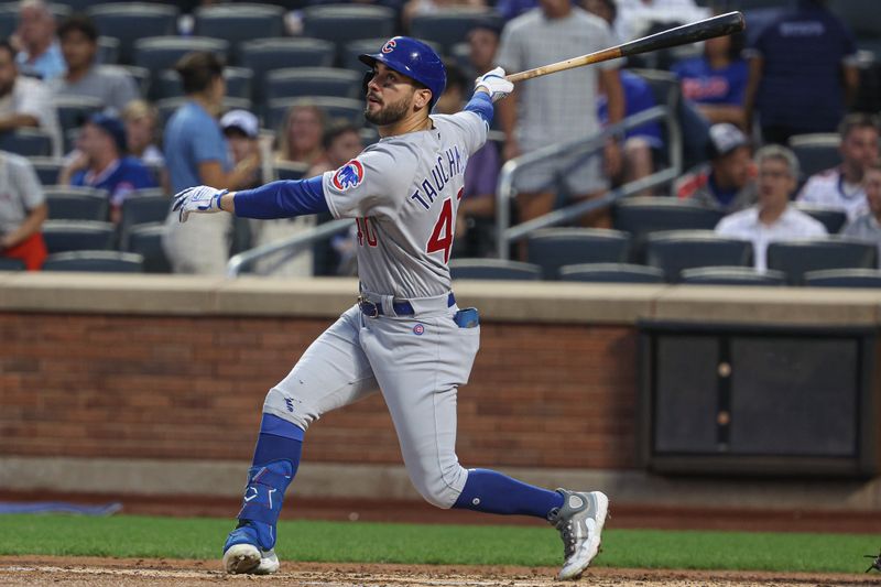 Aug 7, 2023; New York City, New York, USA; Chicago Cubs center fielder Mike Tauchman (40) hits a single during the third inning against the New York Mets at Citi Field. Mandatory Credit: Vincent Carchietta-USA TODAY Sports