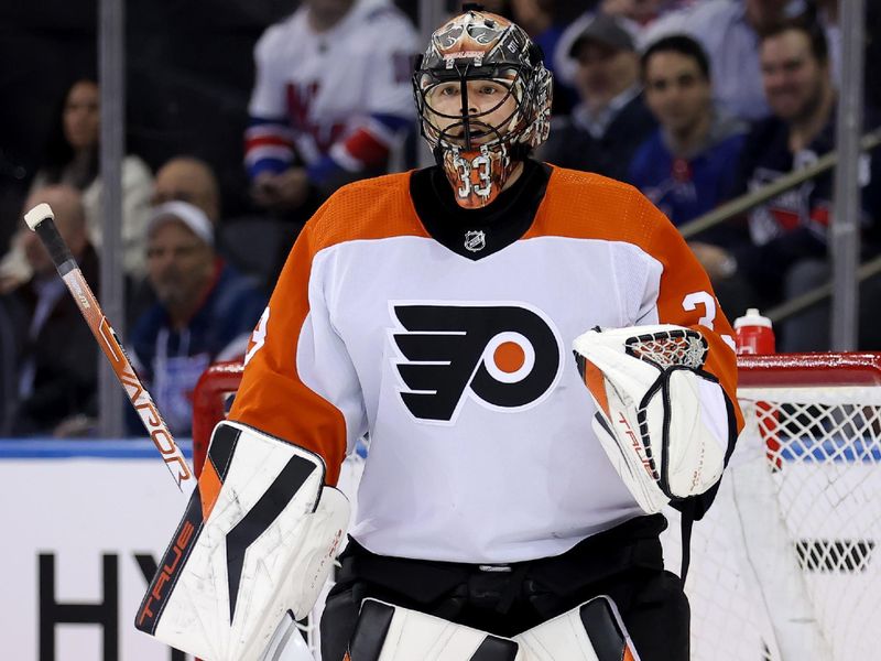 Mar 26, 2024; New York, New York, USA; Philadelphia Flyers goaltender Samuel Ersson (33) tends net during the first period against the New York Rangers at Madison Square Garden. Mandatory Credit: Brad Penner-USA TODAY Sports