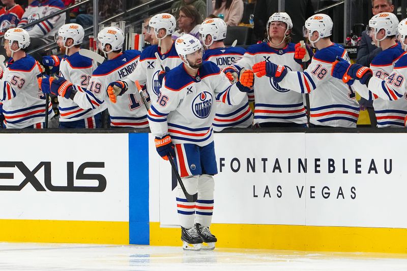 Apr 1, 2025; Las Vegas, Nevada, USA; Edmonton Oilers defenseman Jake Walman (96) celebrates after scoring a goal against the Vegas Golden Knights during the second period at T-Mobile Arena. Mandatory Credit: Stephen R. Sylvanie-Imagn Images