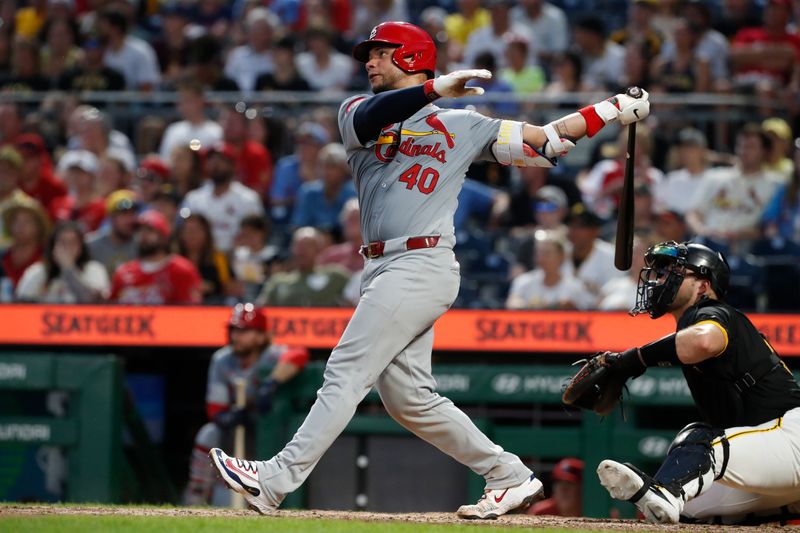 Jul 3, 2024; Pittsburgh, Pennsylvania, USA;  St. Louis Cardinals catcher Willson Contreras (40) hits a two run home run against the Pittsburgh Pirates during the eighth inning at PNC Park. Mandatory Credit: Charles LeClaire-USA TODAY Sports