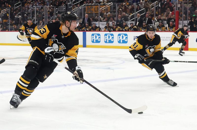 Nov 29, 2025; Pittsburgh, Pennsylvania, USA;  Pittsburgh Penguins left wing Danton Heinen (43) moves the puck into the offensive zone against the Toronto Maple Leafs during the first period at PPG Paints Arena. Mandatory Credit: Charles LeClaire-Imagn Images