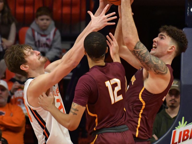 Dec 29, 2022; Champaign, Illinois, USA;  Illinois Fighting Illini forward Matthew Mayer (24) and Bethune-Cookman Wildcats guard Kevin Davis (12) and teammate Derrick Carter-Hollinger Jr. (23) go for the ball during the second half at State Farm Center. Mandatory Credit: Ron Johnson-USA TODAY Sports