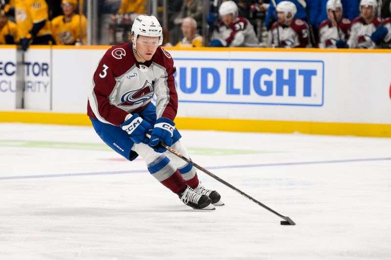 Nov 2, 2024; Nashville, Tennessee, USA;  Colorado Avalanche defenseman John Ludvig (3) skates with the puck against the Nashville Predators during the third period at Bridgestone Arena. Mandatory Credit: Steve Roberts-Imagn Images