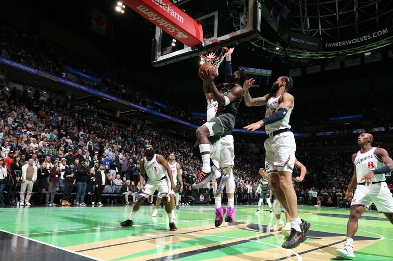 MINNEAPOLIS, MN -  NOVEMBER 29: Anthony Edwards #5 of the Minnesota Timberwolves drives to the basket during the game against the LA Clippers during the Emirates NBA Cup game on November 29, 2024 at Target Center in Minneapolis, Minnesota. NOTE TO USER: User expressly acknowledges and agrees that, by downloading and or using this Photograph, user is consenting to the terms and conditions of the Getty Images License Agreement. Mandatory Copyright Notice: Copyright 2024 NBAE (Photo by David Sherman/NBAE via Getty Images)