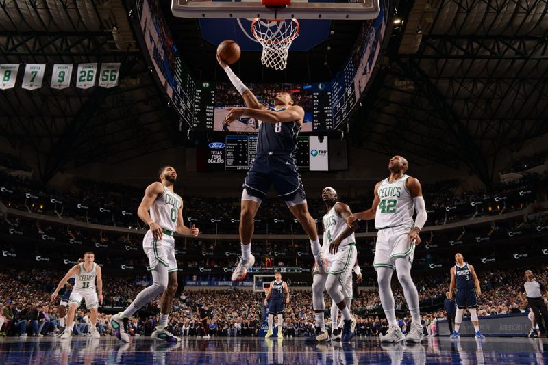 DALLAS, TX - JANUARY 22: Josh Green #8 of the Dallas Mavericks drives to the basket during the game against the Boston Celtics on January 22, 2024 at the American Airlines Center in Dallas, Texas. NOTE TO USER: User expressly acknowledges and agrees that, by downloading and or using this photograph, User is consenting to the terms and conditions of the Getty Images License Agreement. Mandatory Copyright Notice: Copyright 2024 NBAE (Photo by Glenn James/NBAE via Getty Images)