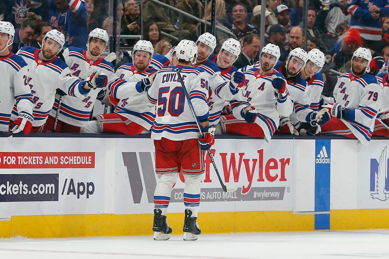 Oct 14, 2023; Columbus, Ohio, USA; New York Rangers left wing Will Cuylle (50) celebrates his goal against the Columbus Blue Jackets during the third period at Nationwide Arena. Mandatory Credit: Russell LaBounty-USA TODAY Sports