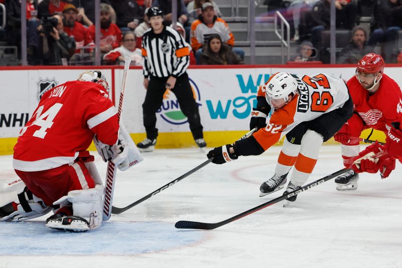 Jan 25, 2024; Detroit, Michigan, USA;  Philadelphia Flyers right wing Olle Lycksell (62) skates with the puck defended by Detroit Red Wings defenseman Shayne Gostisbehere (41) in the third period at Little Caesars Arena. Mandatory Credit: Rick Osentoski-USA TODAY Sports