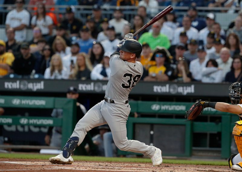 Sep 15, 2023; Pittsburgh, Pennsylvania, USA;  New York Yankees catcher Ben Rortvedt (38) hits an RBI single against the Pittsburgh Pirates during the second inning at PNC Park. Mandatory Credit: Charles LeClaire-USA TODAY Sports