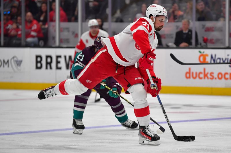 Jan 7, 2024; Anaheim, California, USA; Detroit Red Wings center Dylan Larkin (71) moves in for a shot on goal against the Anaheim Ducks during the first period at Honda Center. Mandatory Credit: Gary A. Vasquez-USA TODAY Sports