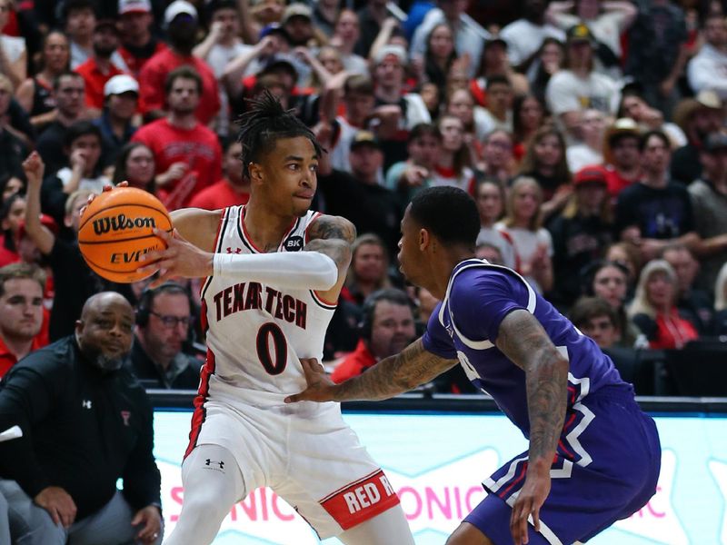 Feb 20, 2024; Lubbock, Texas, USA;  Texas Tech Red Raiders guard Chance McMillian (0) looks to pass the ball around TCU Horned Frogs guard Avery Anderson III (3) in the second half at United Supermarkets Arena. Mandatory Credit: Michael C. Johnson-USA TODAY Sports