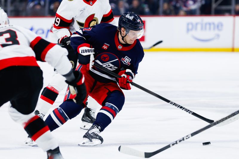 Dec 15, 2025; Winnipeg, Manitoba, CAN;  Winnipeg Jets forward Vladislav Namestnikov (7) skates into the Ottawa Senators zone during the second period at Canada Life Centre. Mandatory Credit: Terrence Lee-Imagn Images