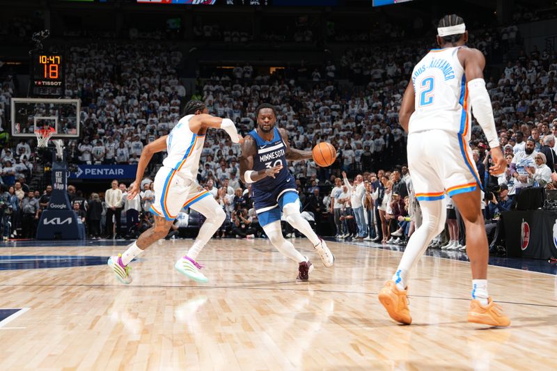 MINNEAPOLIS, MN -  MAY 24: Julius Randle #30 of the Minnesota Timberwolves drives to the basket during the game against the Oklahoma City Thunder during Game 3 of the 2025 NBA Western Conference Finals on May 24, 2025 at Target Center in Minneapolis, Minnesota. NOTE TO USER: User expressly acknowledges and agrees that, by downloading and or using this Photograph, user is consenting to the terms and conditions of the Getty Images License Agreement. Mandatory Copyright Notice: Copyright 2025 NBAE (Photo by David Dow/NBAE via Getty Images)