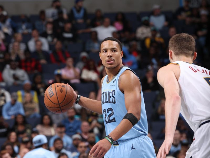 MEMPHIS, TN - NOVEMBER 19: Desmond Bane #22 of the Memphis Grizzlies dribbles the ball during the game against the Denver Nuggets during the Emirates NBA Cup game on November 19, 2024 at FedExForum in Memphis, Tennessee. NOTE TO USER: User expressly acknowledges and agrees that, by downloading and or using this photograph, User is consenting to the terms and conditions of the Getty Images License Agreement. Mandatory Copyright Notice: Copyright 2024 NBAE (Photo by Joe Murphy/NBAE via Getty Images)
