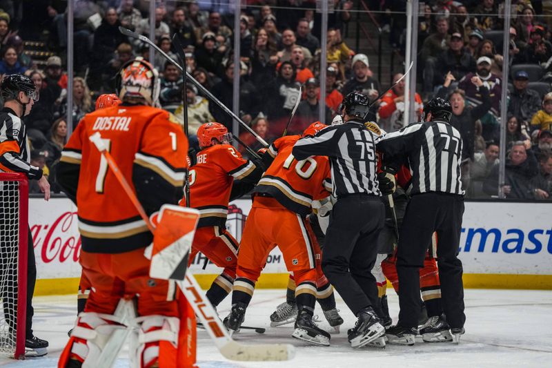 Nov 22, 2025; Anaheim, California, USA; Vegas Golden Knights left wing Brandon Saad (20) and Anaheim Ducks center Ryan Strome (16) scuffle during the third period at Honda Center. Mandatory Credit: Corinne Votaw-Imagn Images