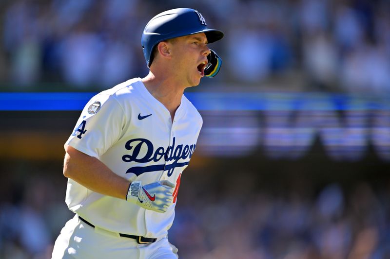 Aug 31, 2025; Los Angeles, California, USA;  Los Angeles Dodgers catcher Will Smith (16) celebrates as he rounds the bases on a walk-off home run in the ninth inning against the Arizona Diamondbacks at Dodger Stadium. Mandatory Credit: Jayne Kamin-Oncea-Imagn Images
