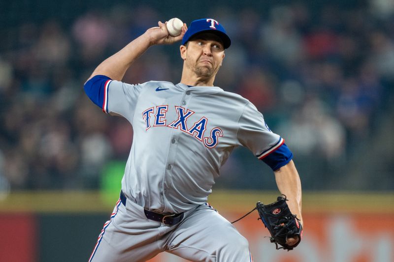 Sep 13, 2024; Seattle, Washington, USA;  Texas Rangers starter Jacob deGrom (48) delivers a pitch during the first inning against the Seattle Mariners at T-Mobile Park. Mandatory Credit: Stephen Brashear-Imagn Images