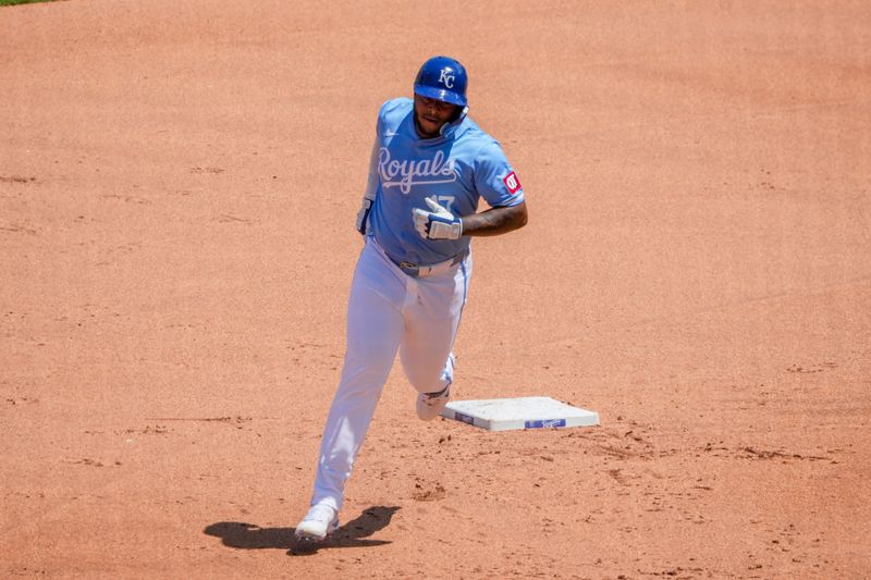 May 22, 2024; Kansas City, Missouri, USA; Kansas City Royals left fielder Nelson Velazquez (17) runs the bases after hitting a solo home run against the Detroit Tigers in the fourth inning at Kauffman Stadium. Mandatory Credit: Denny Medley-USA TODAY Sports