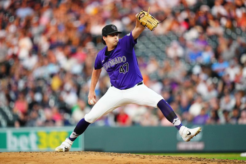 Jul 19, 2024; Denver, Colorado, USA; Colorado Rockies starting pitcher Cal Quantrill (47) delivers a pitch in the sixth inning against the San Francisco Giants at Coors Field. Mandatory Credit: Ron Chenoy-USA TODAY Sports