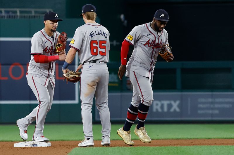 Sep 10, 2024; Washington, District of Columbia, USA; Atlanta Braves players celebrate after their game against the Washington Nationals at Nationals Park. Mandatory Credit: Geoff Burke-Imagn Images