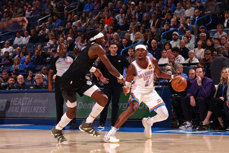 OKLAHOMA CITY, OK - NOVEMBER 20: Shai Gilgeous-Alexander #2 of the Oklahoma City Thunder dribbles the ball during the game against the Portland Trail Blazers on November 20, 2024 at Paycom Center in Oklahoma City, Oklahoma. NOTE TO USER: User expressly acknowledges and agrees that, by downloading and or using this photograph, User is consenting to the terms and conditions of the Getty Images License Agreement. Mandatory Copyright Notice: Copyright 2024 NBAE (Photo by Zach Beeker/NBAE via Getty Images)