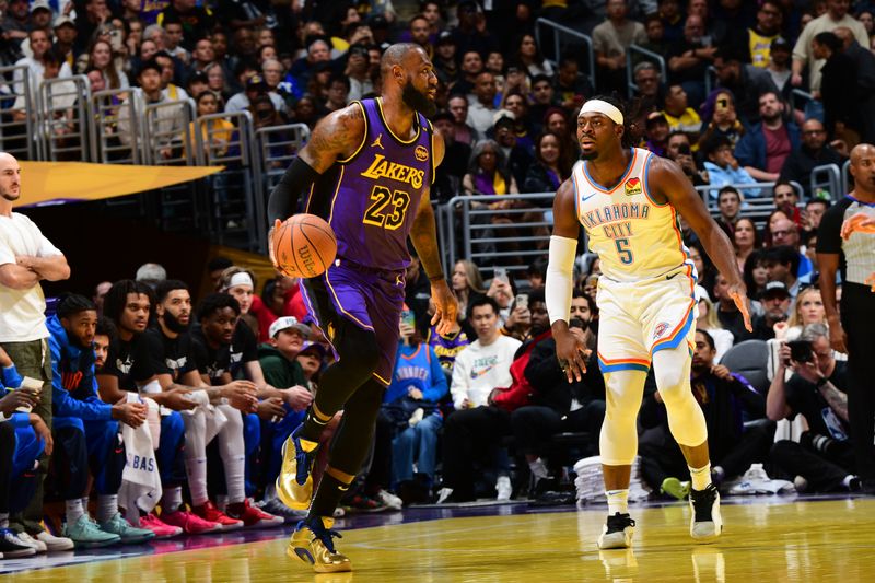 LOS ANGELES, CA - NOVEMBER 29: LeBron James #23 of the Los Angeles Lakers dribbles the ball during the game against the Oklahoma City Thunder during a Emirates NBA Cup game on October 22, 2024 at Crypto.Com Arena in Los Angeles, California. NOTE TO USER: User expressly acknowledges and agrees that, by downloading and/or using this Photograph, user is consenting to the terms and conditions of the Getty Images License Agreement. Mandatory Copyright Notice: Copyright 2024 NBAE (Photo by Adam Pantozzi/NBAE via Getty Images)