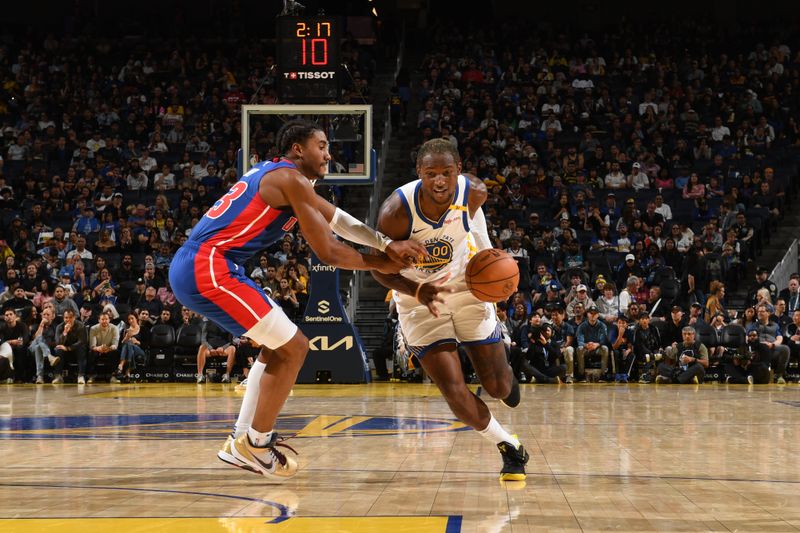 SAN FRANCISCO, CA - OCTOBER 13: Jonathan Kuminga #00 of the Golden State Warriors handles the ball during the game against the Detroit Pistons during a NBA Preseason game on October 13, 2024 at Chase Center in San Francisco, California. NOTE TO USER: User expressly acknowledges and agrees that, by downloading and or using this photograph, user is consenting to the terms and conditions of Getty Images License Agreement. Mandatory Copyright Notice: Copyright 2024 NBAE (Photo by Noah Graham/NBAE via Getty Images)