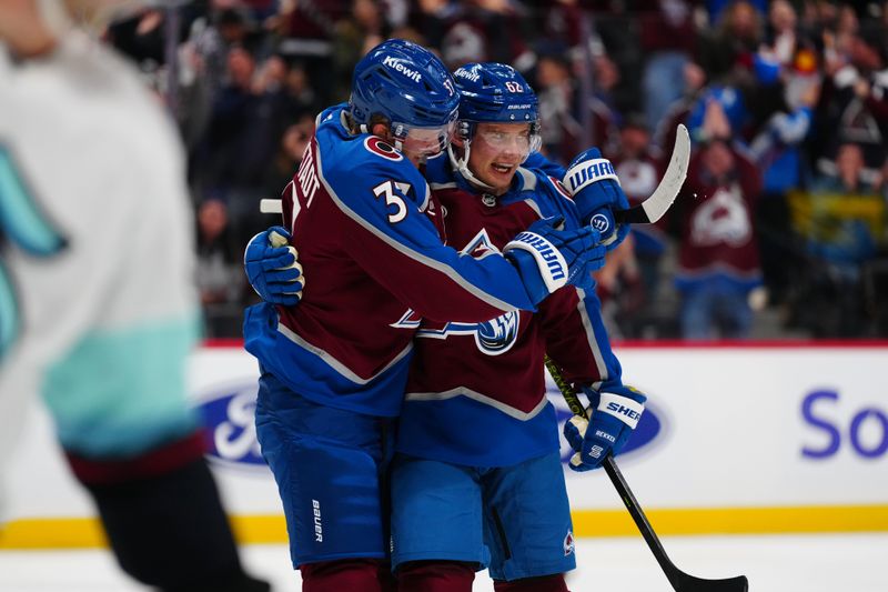 Nov 5, 2024; Denver, Colorado, USA; Colorado Avalanche left wing Artturi Lehkonen (62) celebrates scoring with center Casey Mittelstadt (37) in the second period against the Seattle Kraken at Ball Arena. Mandatory Credit: Ron Chenoy-Imagn Images