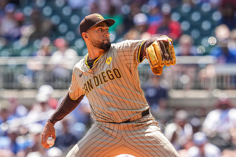May 20, 2024; Cumberland, Georgia, USA; San Diego Padres relief pitcher Robert Suarez (75) pitches against the Atlanta Braves during the ninth inning at Truist Park. Mandatory Credit: Dale Zanine-USA TODAY Sports