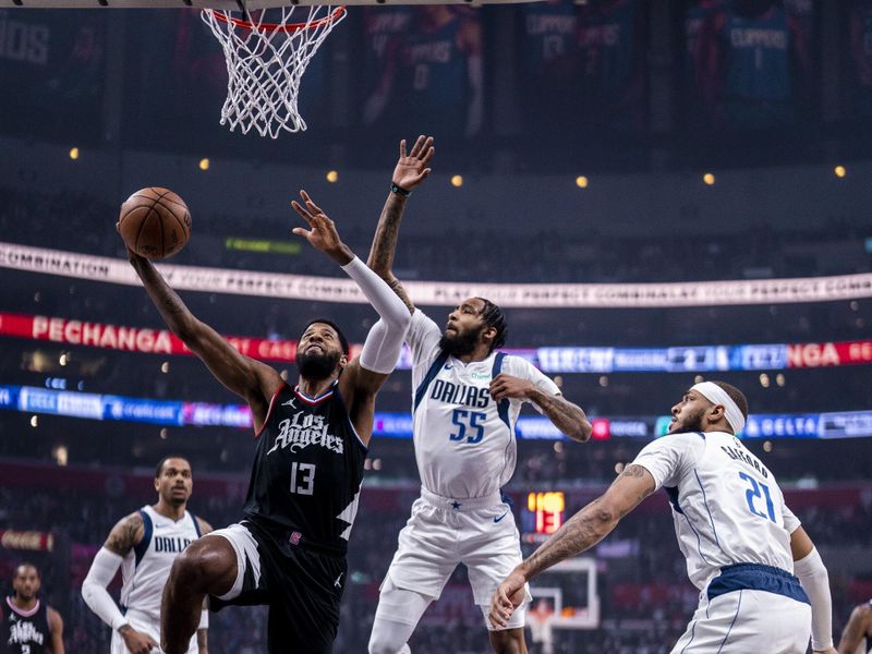 LOS ANGELES, CA - APRIL 23: Paul George #13 of the LA Clippers drives to the basket during the game against the Dallas Mavericks during Round 1 Game 2 of the 2024 NBA Playoffs on April 23, 2024 at Crypto.Com Arena in Los Angeles, California. NOTE TO USER: User expressly acknowledges and agrees that, by downloading and/or using this Photograph, user is consenting to the terms and conditions of the Getty Images License Agreement. Mandatory Copyright Notice: Copyright 2024 NBAE (Photo by Tyler Ross/NBAE via Getty Images)