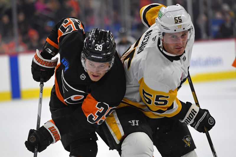 Feb 25, 2025; Philadelphia, Pennsylvania, USA; Philadelphia Flyers right wing Matvei Michkov (39) and Pittsburgh Penguins center Noel Acciari (55) during the third period at Wells Fargo Center. Mandatory Credit: Eric Hartline-Imagn Images