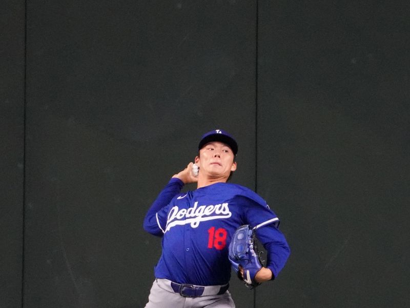 Sep 1, 2024; Phoenix, Arizona, USA;  Los Angeles Dodgers pitcher Yoshinobu Yamamoto (18) throws before the game against the Arizona Diamondbacks at Chase Field. Mandatory Credit: Joe Camporeale-USA TODAY Sports