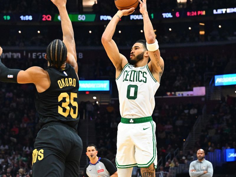 CLEVELAND, OHIO - MARCH 05: Jayson Tatum #0 of the Boston Celtics shoots over Isaac Okoro #35 of the Cleveland Cavaliers during the second quarter at Rocket Mortgage Fieldhouse on March 05, 2024 in Cleveland, Ohio. NOTE TO USER: User expressly acknowledges and agrees that, by downloading and or using this photograph, User is consenting to the terms and conditions of the Getty Images License Agreement. (Photo by Jason Miller/Getty Images)