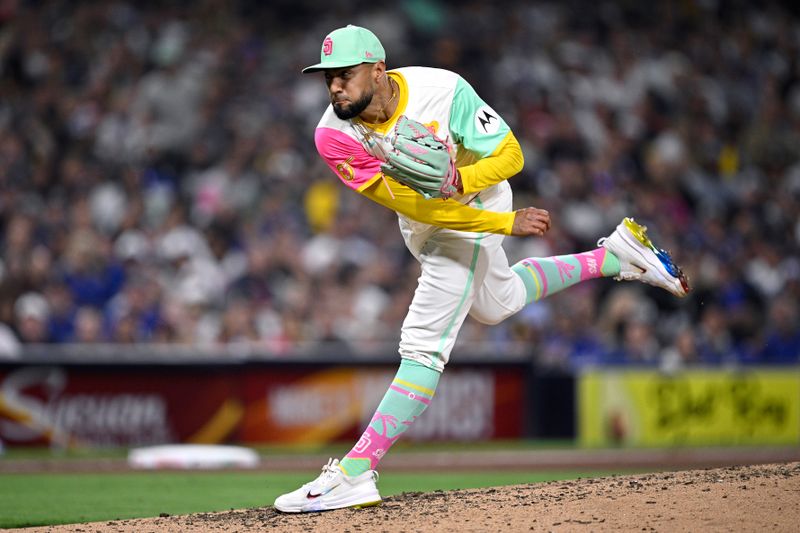 May 10, 2024; San Diego, California, USA; San Diego Padres relief pitcher Robert Suarez (75) throws a pitch against the Los Angeles Dodgers during the ninth inning at Petco Park. Mandatory Credit: Orlando Ramirez-USA TODAY Sports