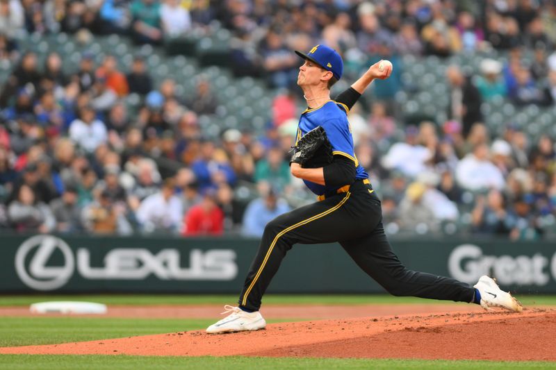 Apr 26, 2024; Seattle, Washington, USA; Seattle Mariners starting pitcher Emerson Hancock (62) pitches to the Arizona Diamondbacks during the second inning at T-Mobile Park. Mandatory Credit: Steven Bisig-USA TODAY Sports