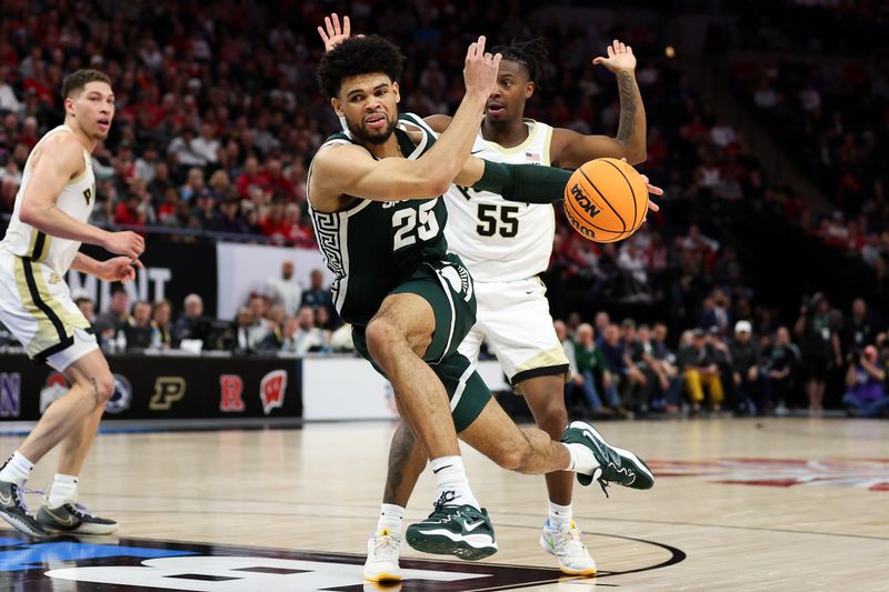 Mar 15, 2024; Minneapolis, MN, USA; Michigan State Spartans forward Malik Hall (25) works around Purdue Boilermakers guard Lance Jones (55) during the second half at Target Center. Mandatory Credit: Matt Krohn-USA TODAY Sports