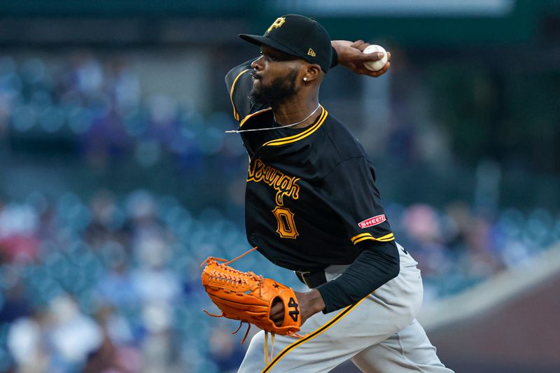 Sep 4, 2024; Chicago, Illinois, USA; Pittsburgh Pirates starting pitcher Domingo Germán (0) delivers a pitch against the Chicago Cubs during the first inning at Wrigley Field. Mandatory Credit: Kamil Krzaczynski-Imagn Images
