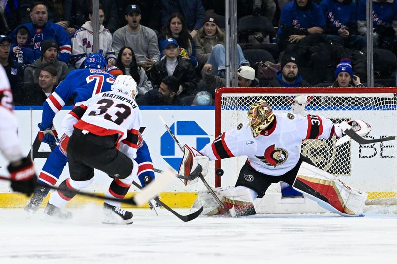 Jan 21, 2025; New York, New York, USA;  New York Rangers center Matt Rempe (73) scores a goal past Ottawa Senators goaltender Anton Forsberg (31) during the third period at Madison Square Garden. Mandatory Credit: Dennis Schneidler-Imagn Images
