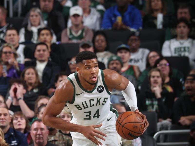 MILWAUKEE, WI - NOVEMBER 7: Giannis Antetokounmpo #34 of the Milwaukee Bucks dribbles the ball during the game against the Utah Jazz on November 7, 2024 at Fiserv Forum Center in Milwaukee, Wisconsin. NOTE TO USER: User expressly acknowledges and agrees that, by downloading and or using this Photograph, user is consenting to the terms and conditions of the Getty Images License Agreement. Mandatory Copyright Notice: Copyright 2024 NBAE (Photo by Gary Dineen/NBAE via Getty Images).