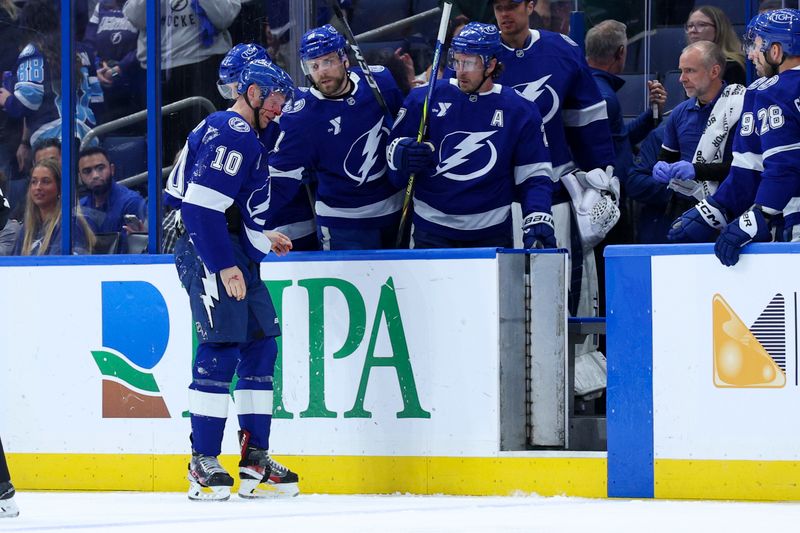 Mar 24, 2026; Tampa, Florida, USA; Tampa Bay Lightning right wing Corey Perry (10) skates off the ice after a fight against the Minnesota Wild in the first period at Benchmark International Arena. Mandatory Credit: Nathan Ray Seebeck-Imagn Images