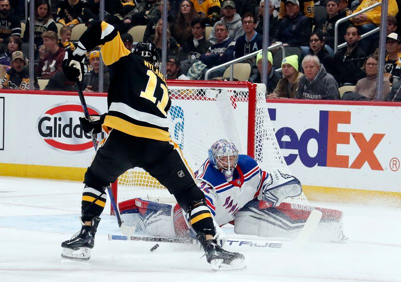 Nov 22, 2023; Pittsburgh, Pennsylvania, USA; New York Rangers goaltender Jonathan Quick (32) defends the net against Pittsburgh Penguins left wing Alex Nylander (11) during the first period at PPG Paints Arena. Mandatory Credit: Charles LeClaire-USA TODAY Sports