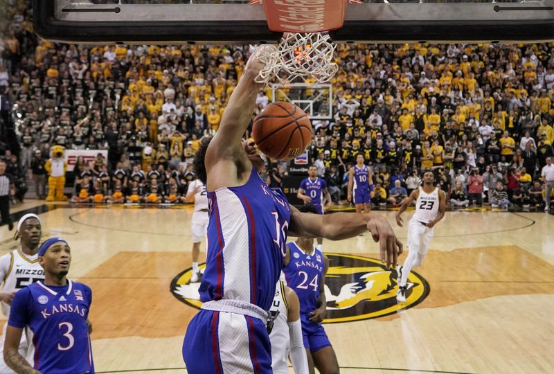 Dec 10, 2022; Columbia, Missouri, USA; Kansas Jayhawks guard Kevin McCullar Jr. (15) dunks the ball against the Missouri Tigers during the first half at Mizzou Arena. Mandatory Credit: Denny Medley-USA TODAY Sports