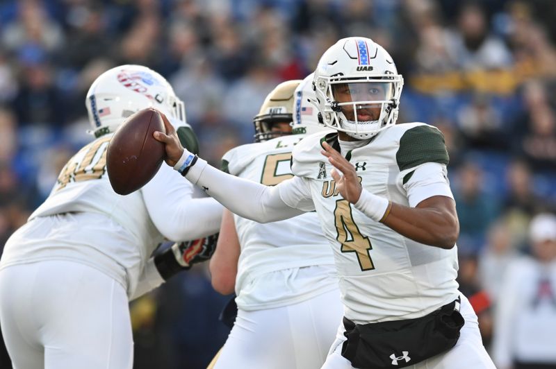 Nov 11, 2023; Annapolis, Maryland, USA;  UAB Blazers quarterback Jacob Zeno (4) throws from the pocket during the first half against the UAB Blazers at Navy-Marine Corps Memorial Stadium. Mandatory Credit: Tommy Gilligan-USA TODAY Sports