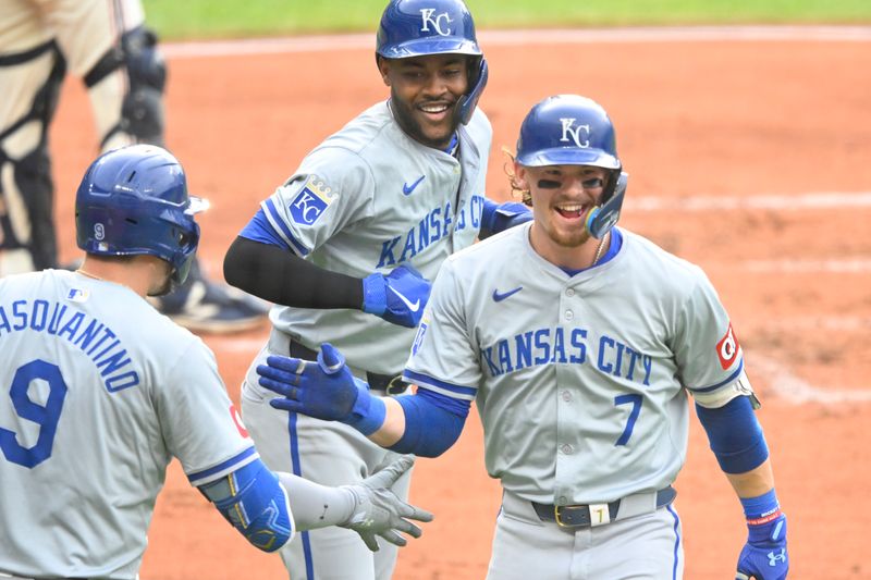 Jun 4, 2024; Cleveland, Ohio, USA; Kansas City Royals shortstop Bobby Witt Jr. (7) celebrates his two-run home run with first baseman Vinnie Pasquantino (9) and third baseman Maikel Garcia (11) in the third inning against the Cleveland Guardians at Progressive Field. Mandatory Credit: David Richard-USA TODAY Sports