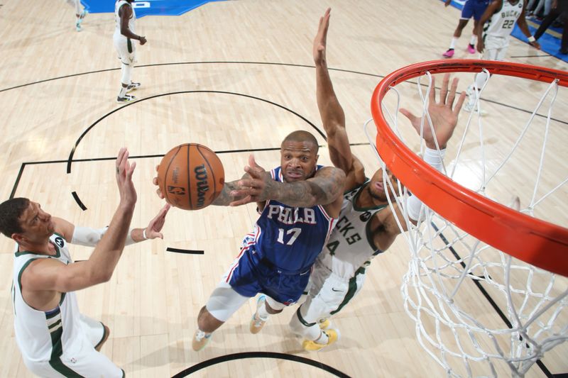 MILWAUKEE, WI - APRIL 2: P.J. Tucker #17 of the Philadelphia 76ers drives to the basket during the game against the Milwaukee Bucks on April 2, 2023 at the Fiserv Forum Center in Milwaukee, Wisconsin. NOTE TO USER: User expressly acknowledges and agrees that, by downloading and or using this Photograph, user is consenting to the terms and conditions of the Getty Images License Agreement. Mandatory Copyright Notice: Copyright 2023 NBAE (Photo by Gary Dineen/NBAE via Getty Images).