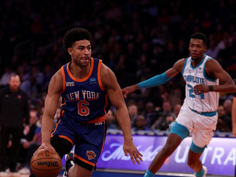 NEW YORK, NEW YORK - NOVEMBER 28:  Quentin Grimes #6 of the New York Knicks heads to the net as Brandon Miller #24 of the Charlotte Hornets defends during the first half of an NBA In-Season Tournament game at Madison Square Garden on November 28, 2023 in New York City. NOTE TO USER: User expressly acknowledges and agrees that, by downloading and or using this photograph, User is consenting to the terms and conditions of the Getty Images License Agreement. (Photo by Elsa/Getty Images)