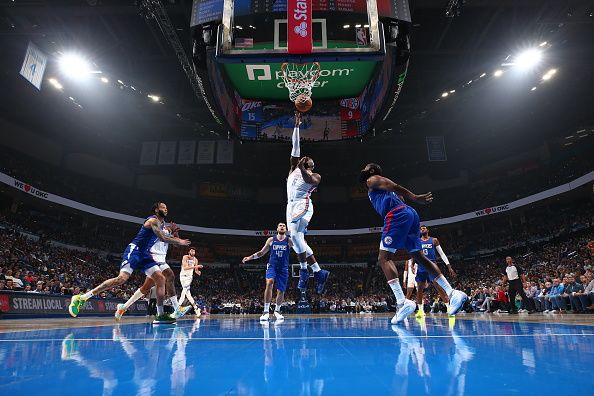 OKLAHOMA CITY, OK - DECEMBER 21: Luguentz Dort #5 of the Oklahoma City Thunder shoots the ball during the game against the LA Clippers on December 21, 2023 at Paycom Arena in Oklahoma City, Oklahoma. NOTE TO USER: User expressly acknowledges and agrees that, by downloading and or using this photograph, User is consenting to the terms and conditions of the Getty Images License Agreement. Mandatory Copyright Notice: Copyright 2023 NBAE (Photo by Zach Beeker/NBAE via Getty Images)