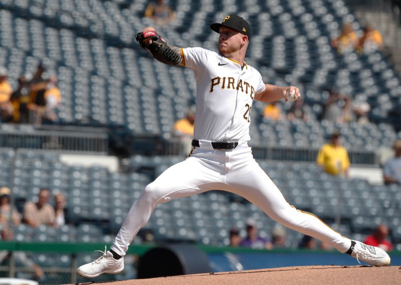 Sep 11, 2024; Pittsburgh, Pennsylvania, USA;  Pittsburgh Pirates pitcher Bailey Falter (26) delivers a pitch against the Miami Marlins during the first inning at PNC Park. Mandatory Credit: Charles LeClaire-Imagn Images