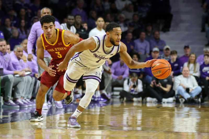 Feb 18, 2023; Manhattan, Kansas, USA; Kansas State Wildcats guard Markquis Nowell (1) steals the ball from Iowa State Cyclones guard Tamin Lipsey (3) during the first half at Bramlage Coliseum. Mandatory Credit: Scott Sewell-USA TODAY Sports