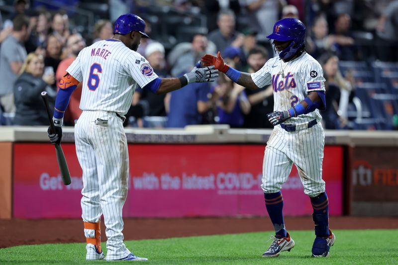 Sep 18, 2024; New York City, New York, USA; New York Mets shortstop Luisangel Acuna (2) celebrates his solo home run against the Washington Nationals with designated hitter Starling Marte (6) during the eighth inning at Citi Field. Mandatory Credit: Brad Penner-Imagn Images